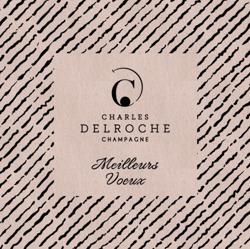 Marques de sillons noirs en diagonales autour de la marque Champagne Charles Delroche sur papier crush