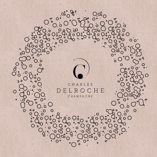 Dessin de bulles noires en cercles tournant autour de la marque Champagne Charles Delroche sur papier crush